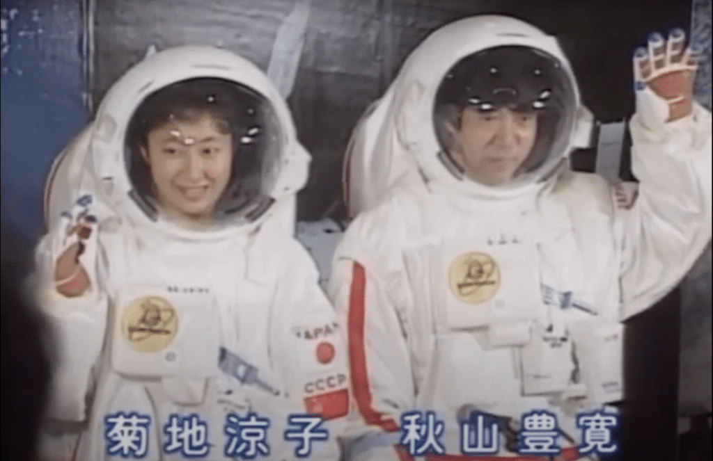 Kikuchi Ryoko and Akiyama Toyohiro in space suites; either could have been the first Japanese astronaut.